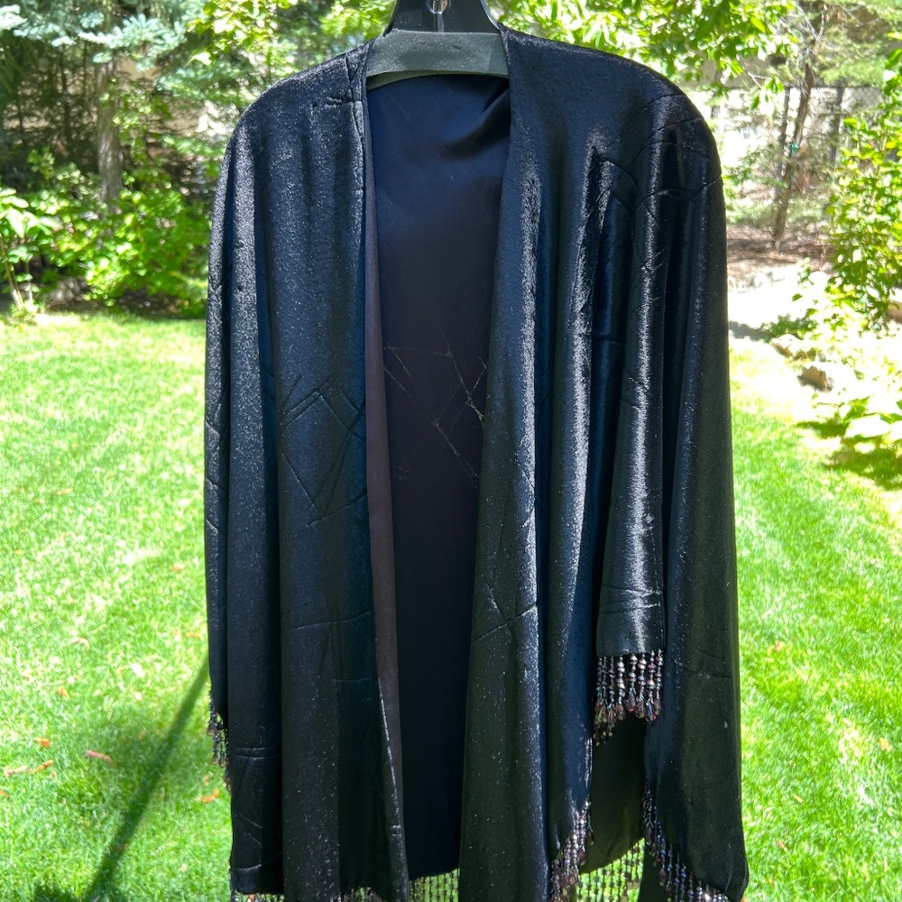 Black cape with beading M/L - $950 purchase price.